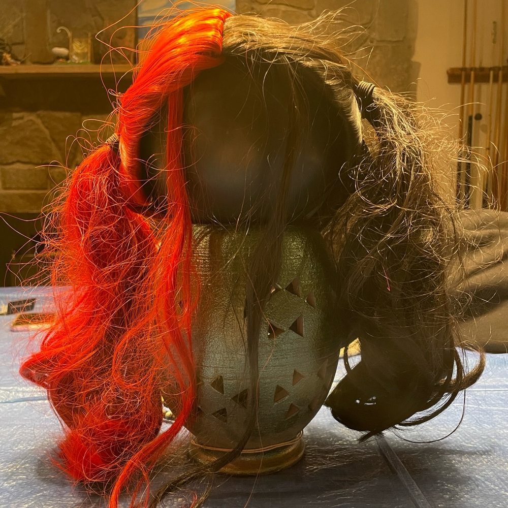 New without tags red/black pigtail wig. I bought this and decided to dye my hair